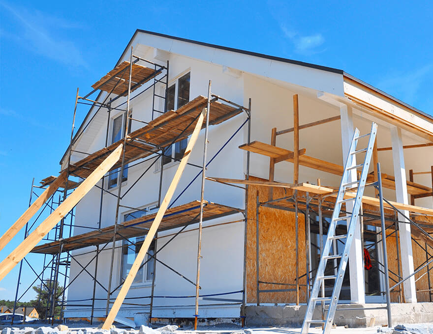 Half-painted-house-wall-facade-during-exterior-renovations-1