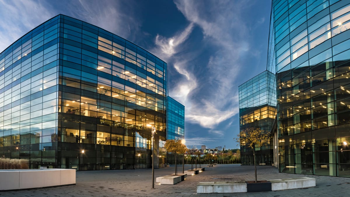 Exterior shot of office buildings at twilight