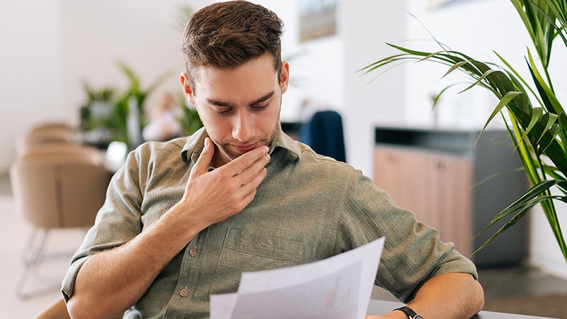 Man thinking at desk