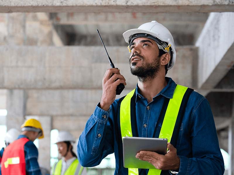 Man-managing-construction-site