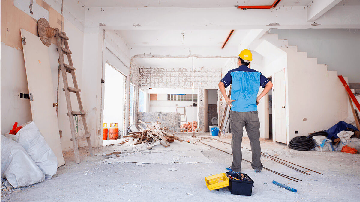Man-working-on-renovating-a-property-1