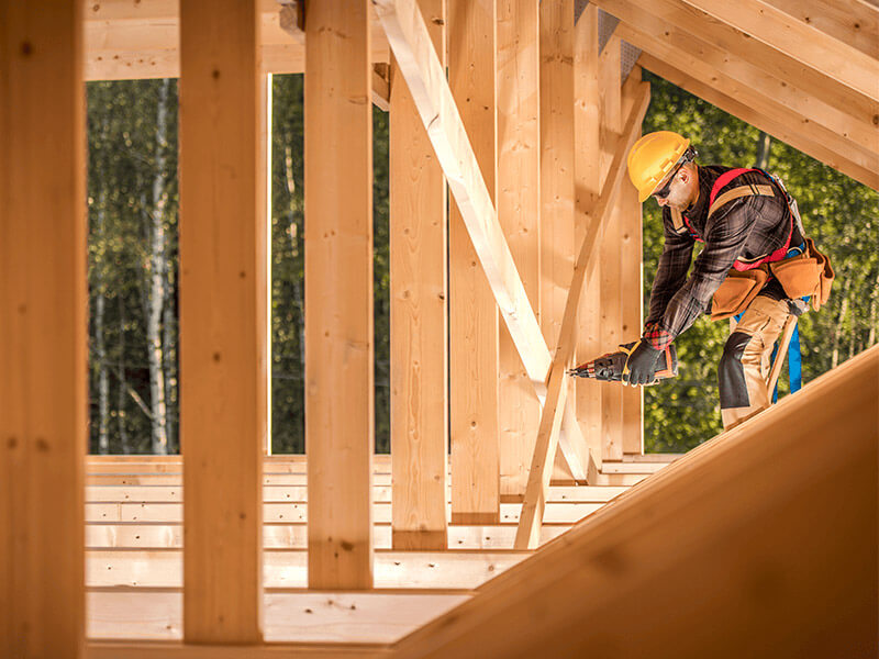 Builder-working-on-house-frame-1