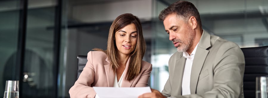 Financial Consultant and Client in an office