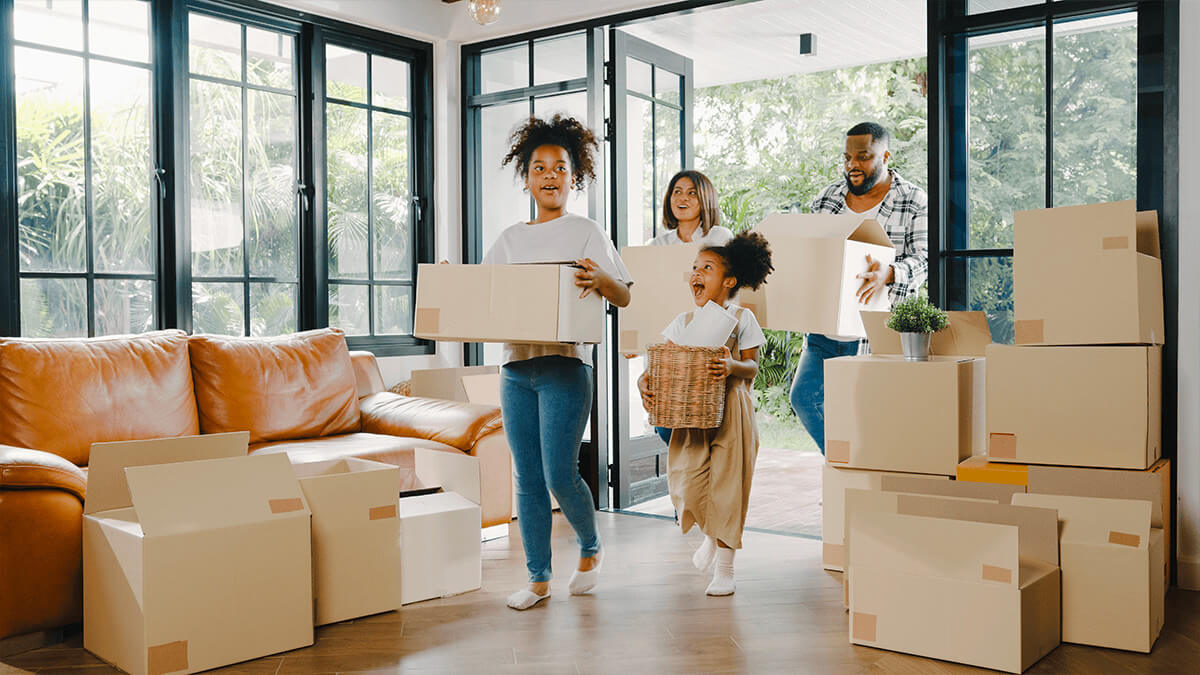 Happy-family-moving-into-new-house-1