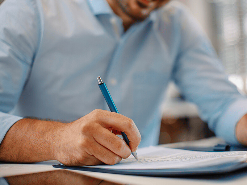 Man-signing-contract-1